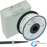 A box of Critchely Z type markers and a reel of 500 white critchley z type marker. The image has a carrier strip beside the reel